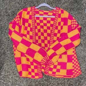 Vibrant Pink and Orange Checkered Sweater
